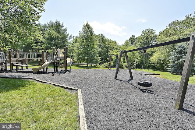 community playground featuring a yard