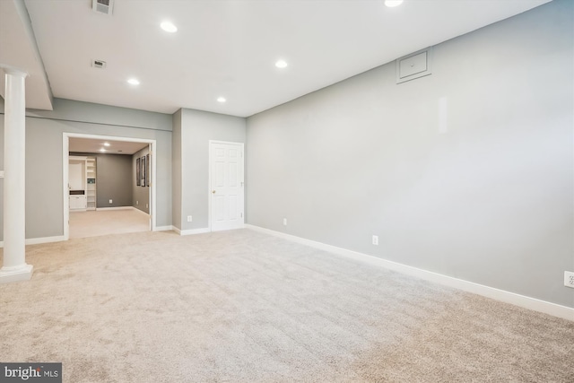 interior space featuring recessed lighting, visible vents, baseboards, and light carpet