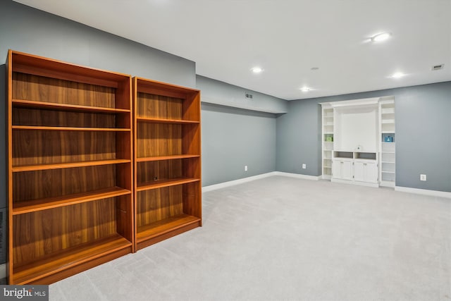 basement with recessed lighting, carpet floors, visible vents, and baseboards