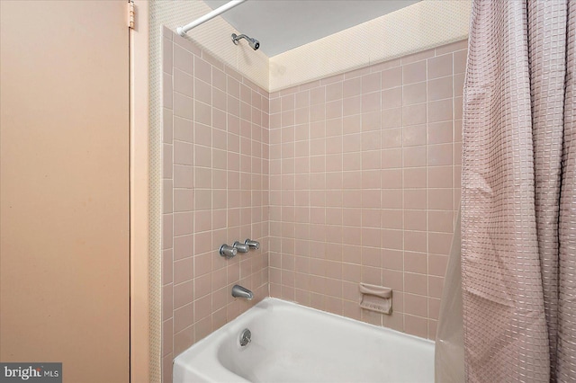 full bath with shower / bath combination with curtain