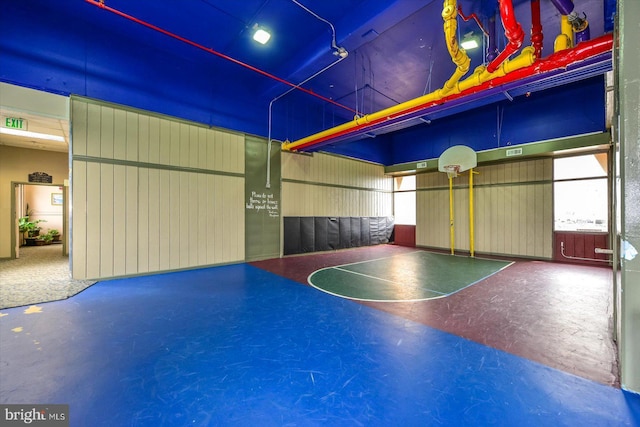 view of basketball court featuring community basketball court and fence