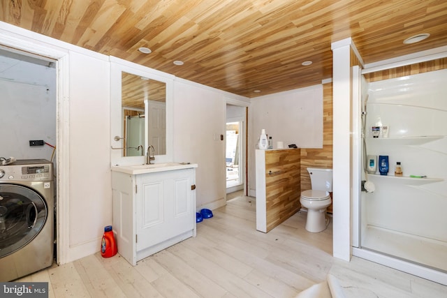 full bathroom with wood ceiling, toilet, washer / clothes dryer, and wood finished floors