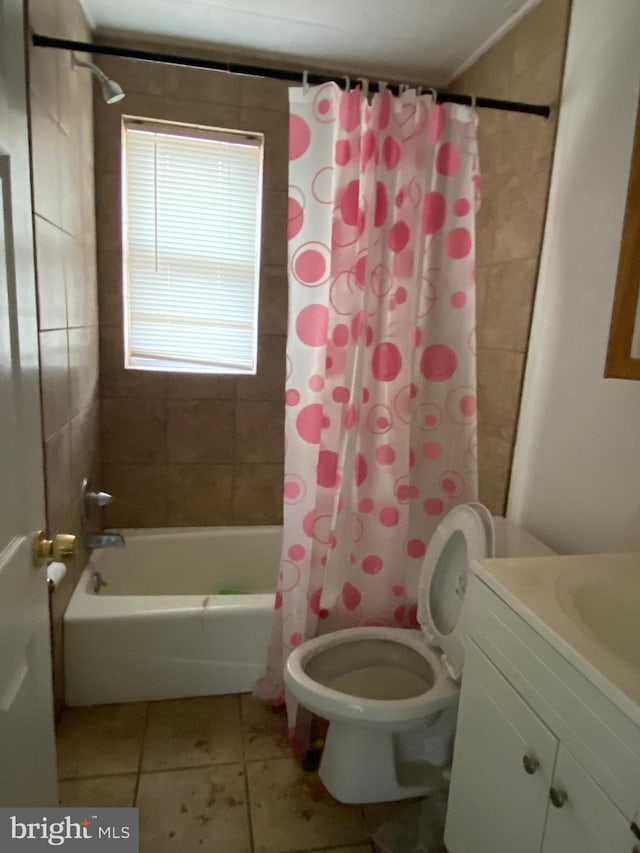 full bath with tile patterned floors, toilet, shower / bath combo, and vanity