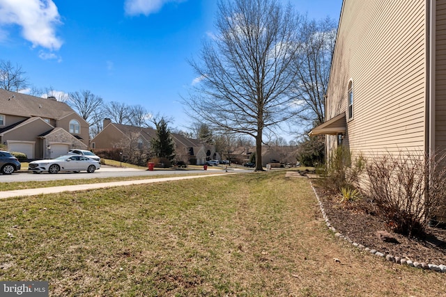 view of yard with a residential view