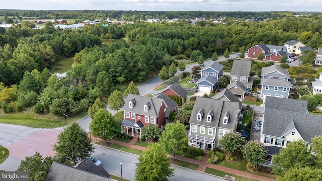 bird's eye view with a residential view and a forest view