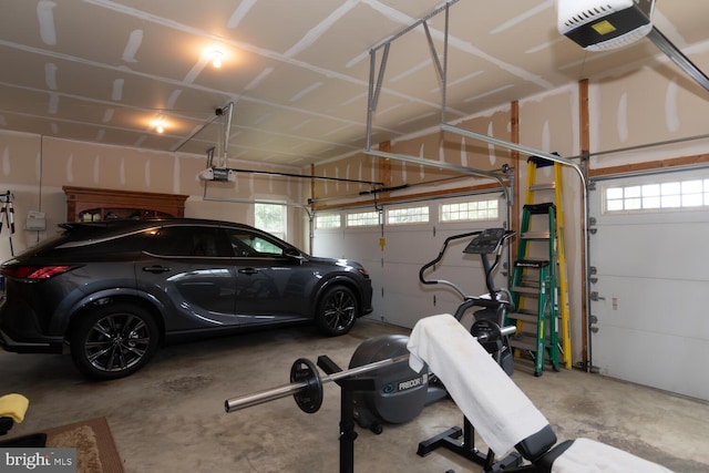 garage featuring a garage door opener