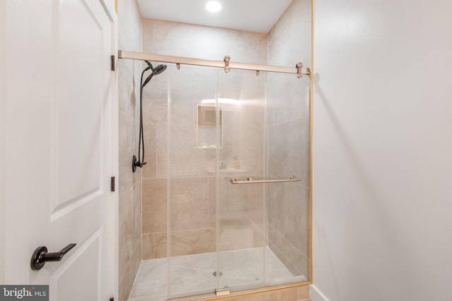 full bathroom with a shower stall