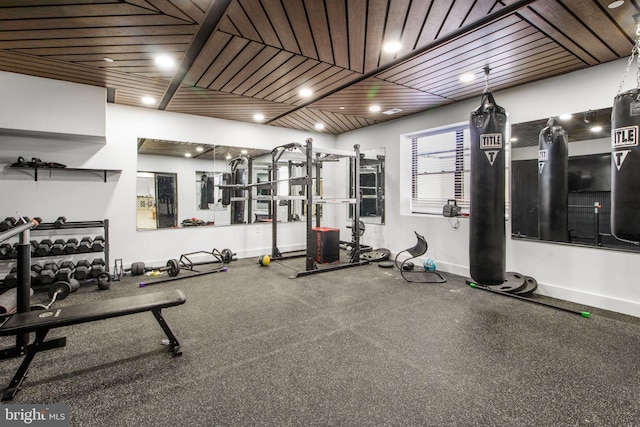 workout area with recessed lighting, wood ceiling, and baseboards