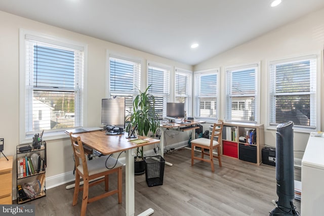 home office with recessed lighting, light wood-style flooring, baseboards, and vaulted ceiling