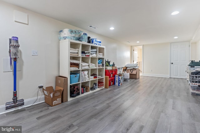 playroom featuring recessed lighting, visible vents, baseboards, and wood finished floors