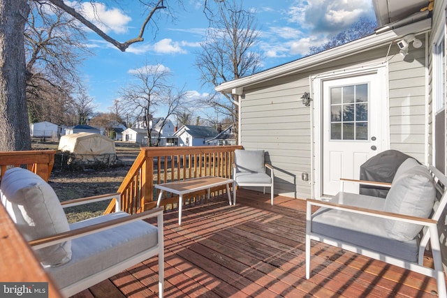 wooden deck featuring fence