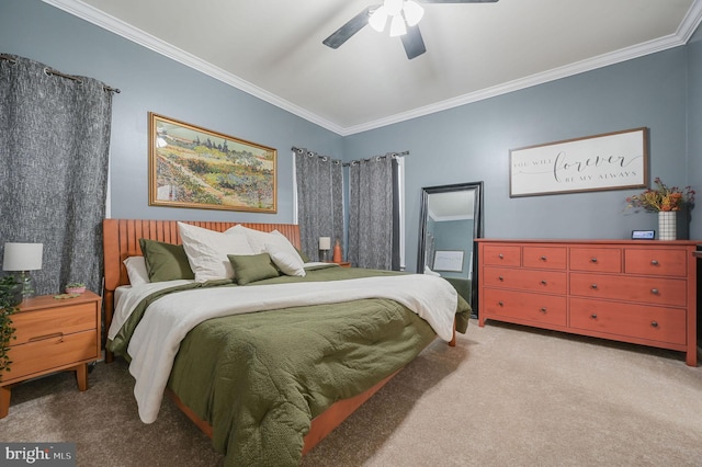 carpeted bedroom with ceiling fan and ornamental molding