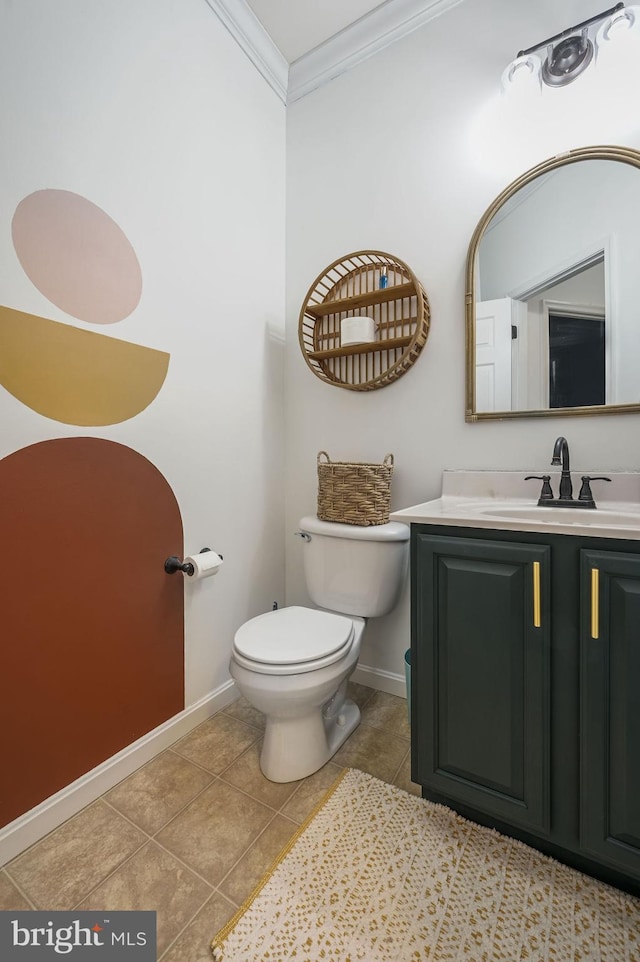 half bathroom with vanity, baseboards, tile patterned flooring, crown molding, and toilet