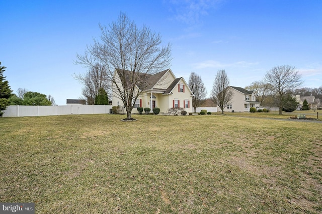 view of yard with fence