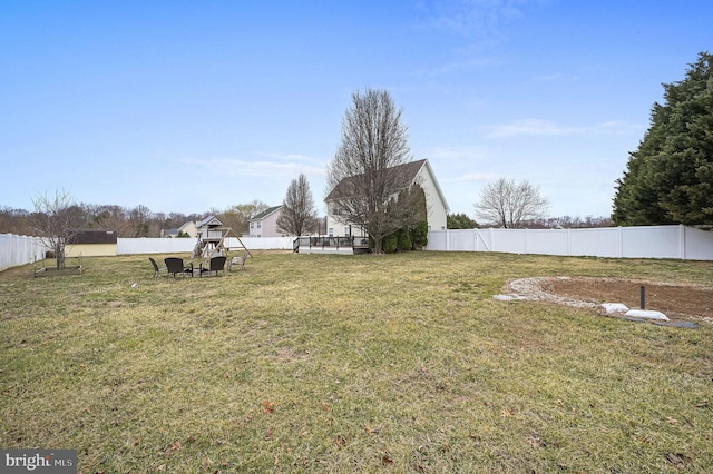 view of yard with a fenced backyard