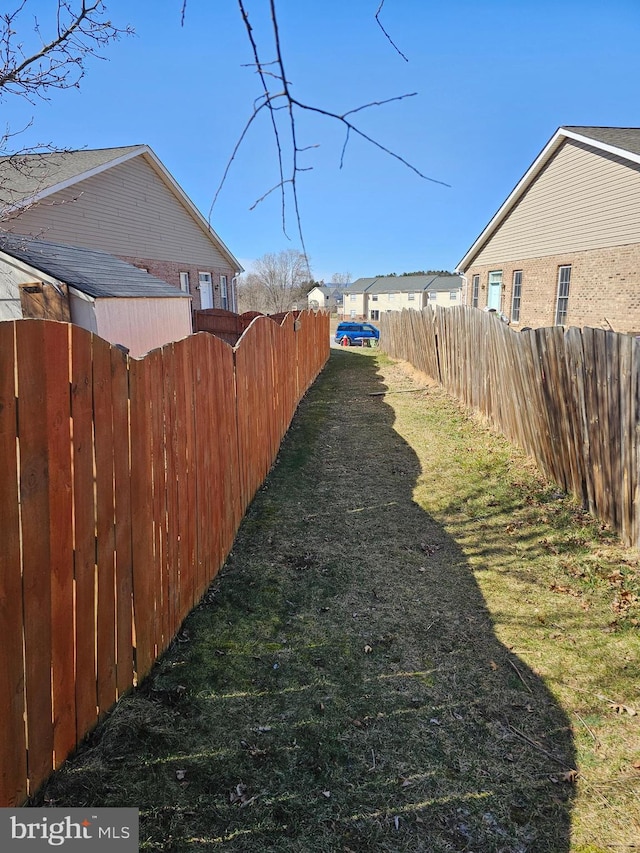 view of yard featuring fence