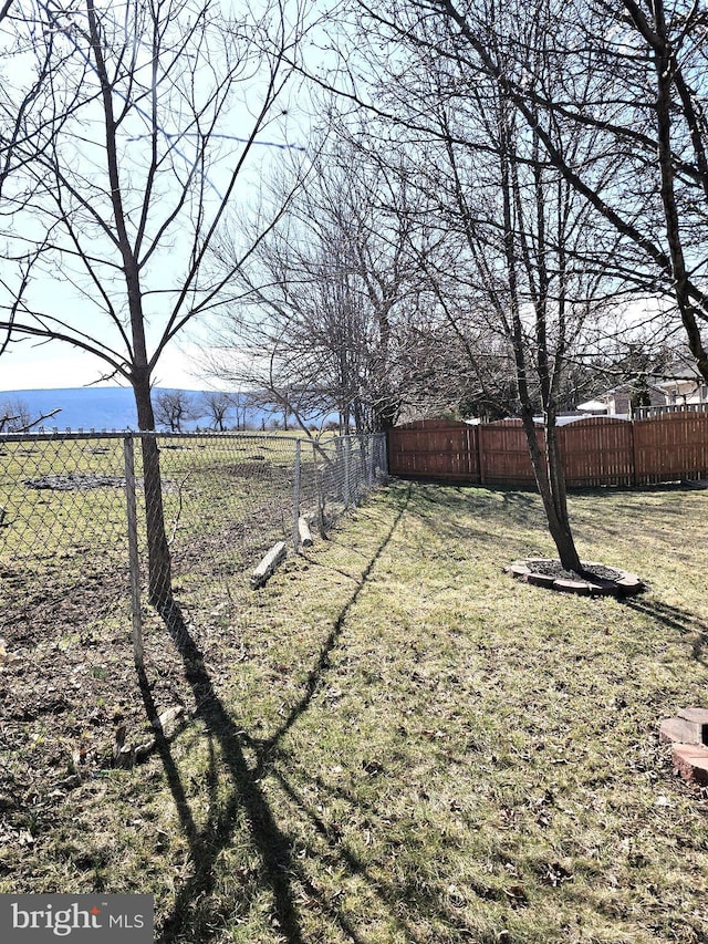 view of yard with fence