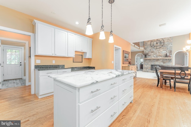 1052 Cedar Mill Ln, West Chester, PA 19382 - kitchen with light wood-type flooring, white cabinets, decorative light fixtures, open floor plan, and recessed lighting