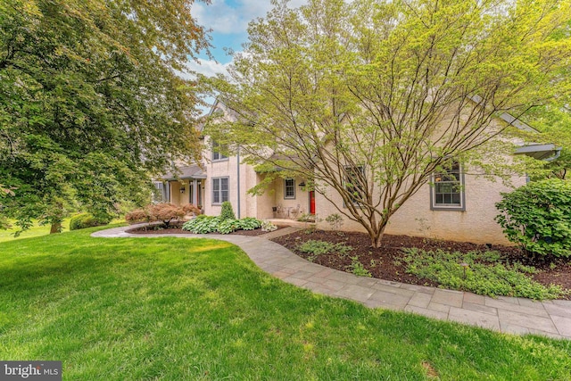 1052 Cedar Mill Ln, West Chester, PA 19382 - obstructed view of property featuring stucco siding and a front yard
