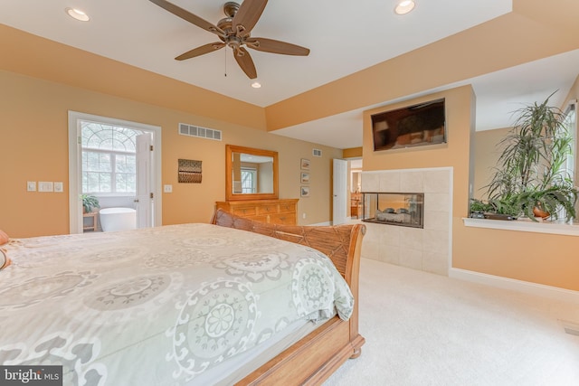 1052 Cedar Mill Ln, West Chester, PA 19382 - carpeted bedroom with recessed lighting, a tiled fireplace, a ceiling fan, and baseboards