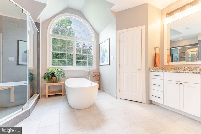 1052 Cedar Mill Ln, West Chester, PA 19382 - full bath with a shower stall, a freestanding tub, lofted ceiling, vanity, and tile patterned floors