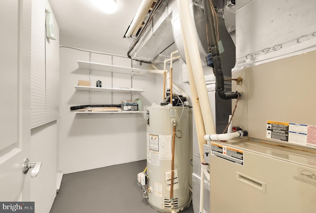 utility room featuring gas water heater