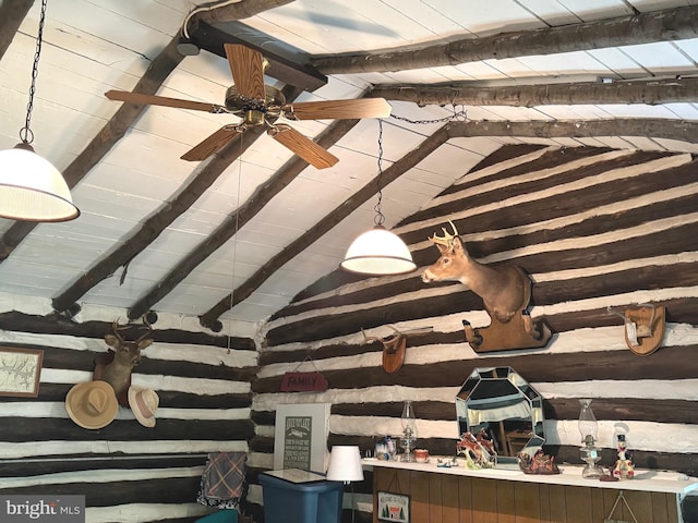 room details featuring beamed ceiling, wood ceiling, log walls, and ceiling fan