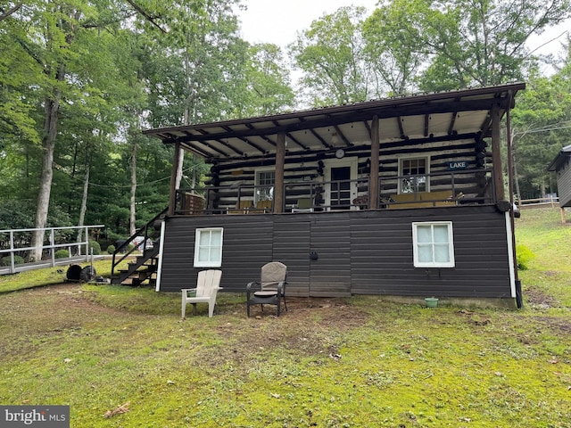 exterior space with log exterior and stairs