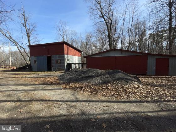 view of outbuilding featuring an outdoor structure