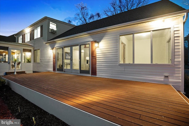 wooden deck featuring french doors