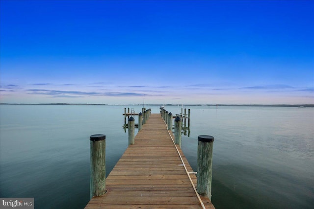 view of dock with a water view