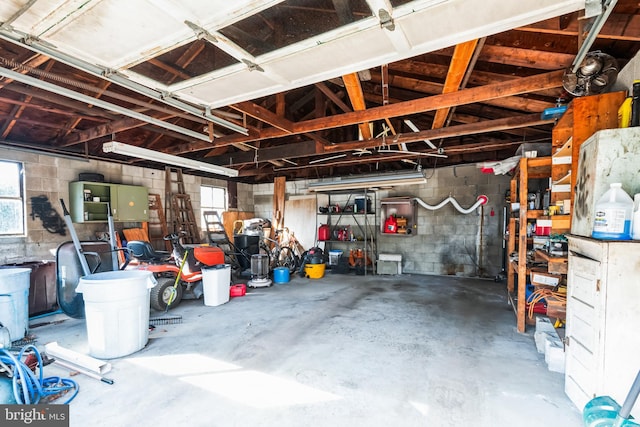 garage featuring concrete block wall