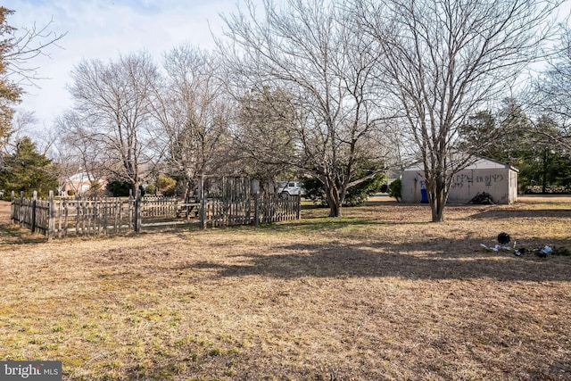 view of yard featuring fence