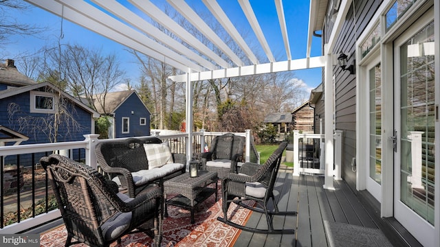 wooden terrace featuring an outdoor living space