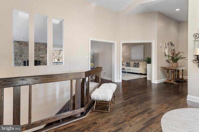 interior space with recessed lighting, baseboards, and wood finished floors