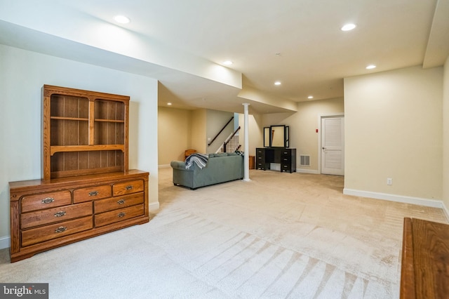 living area with stairs, recessed lighting, visible vents, and carpet floors