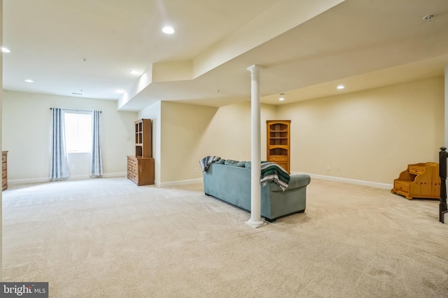 living room with recessed lighting, baseboards, and light carpet