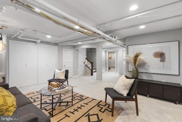 living area with stairway, recessed lighting, and carpet floors