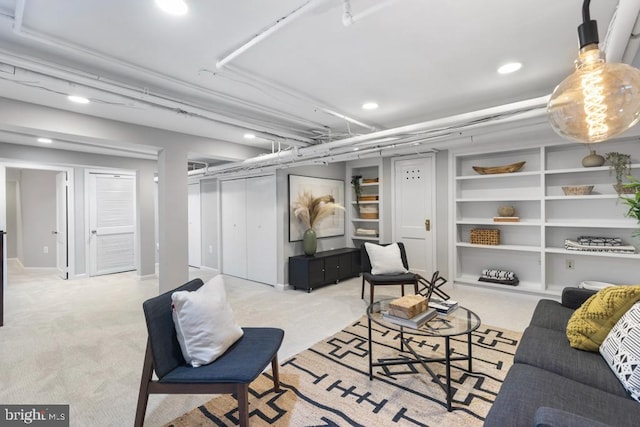 living area featuring recessed lighting and carpet floors