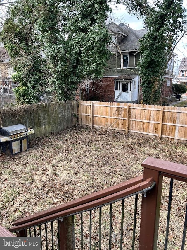 view of yard featuring a fenced backyard