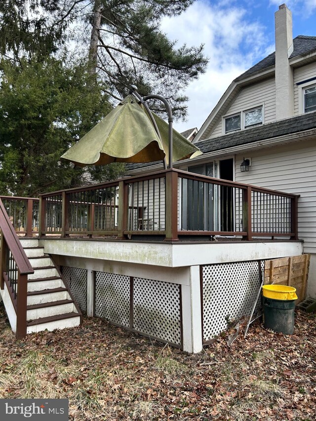 exterior space featuring stairway and a deck