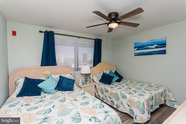 bedroom featuring ceiling fan and wood finished floors