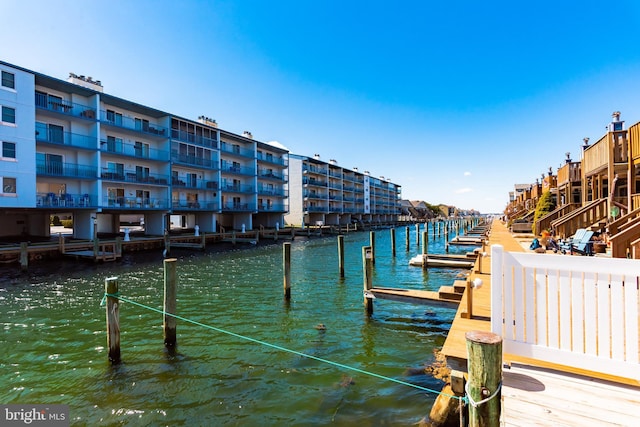 dock area with a water view