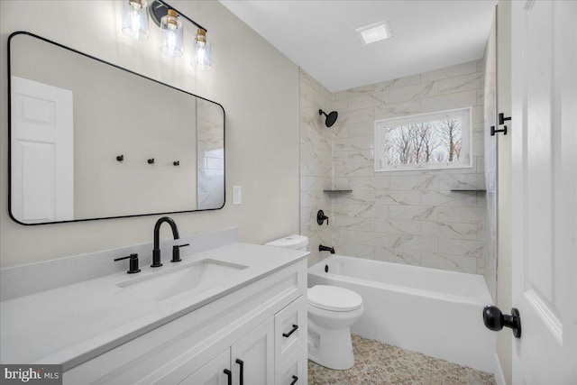 full bath featuring toilet,  shower combination, and vanity