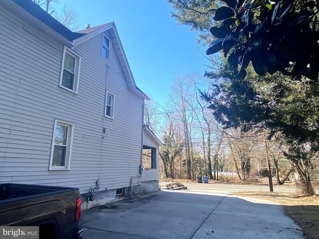 view of home's exterior with a patio