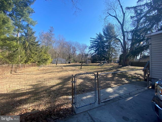 view of road featuring a gate