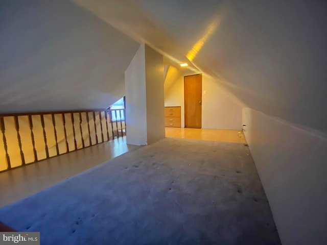 bonus room featuring lofted ceiling