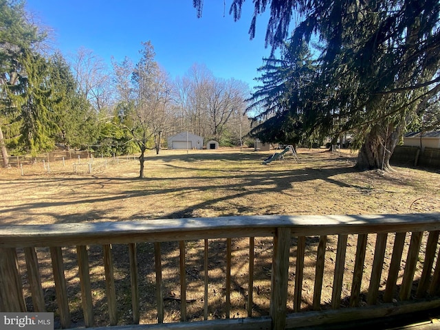 view of yard featuring fence