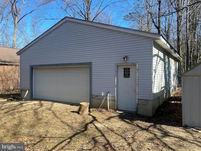 view of detached garage