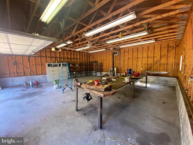 garage featuring concrete block wall